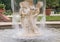 Cherub fountain with blurred water flowing