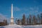 Chesma obelisk in Gatchina Park. Sunny winter`s day.