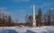 Chesma obelisk in Gatchina Park. Sunny winter`s day.