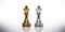 Chess Battle A Dramatic Confrontation Between Silver And Gold Queen Chess Pieces Isolated On A White