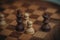 Chess board and chess pieces, Wooden chess pieces on a chess board. Close-up, pawn and queen, dark and light