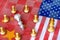 Chess board game pieces on USA and China flag background, trade war tension situation concept