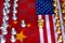 Chess board game pieces on USA and China flag background, trade war tension situation concept