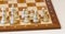 Chess board with white pieces