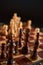 Chess figures on chessboard on retro background, Queen gambit