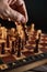 Chess figures on chessboard on retro background, Queen gambit