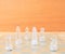 Chess glass on board game. On a vintage wooden floor background Concept competition business success