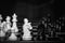 Chess knights head to head. Black and white image