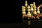 Chess pieces on a black background. Play chess. Checkmate. The concept of defeat and victory.