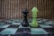 Chess pieces on a marble chessboard