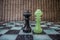 Chess pieces on a marble chessboard