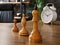 Chess pieces stand on the table as a symbol of career, professional growth and corporate hierarchy.