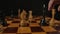 The chess player checkmate with white queen to the black king. The King Fell