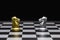 Chess of silver and gold horses face each other in a chess game