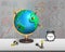 Chess stand on 3d map globe with alarm clock