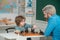 Chess success and winning. Family relationship with son. Cute boy developing chess strategy. Concept of education and