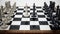 Chessboard with black and white kings facing each other. 3D illustration