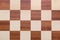 Chessboard texture top view. Checkered wooden background