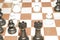 Chessboard under black chessmen as a leisure theme