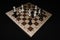 Chessboard with white pieces like a sport background