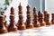 Chessmen on a chessboard, white background, Chess pieces on a chessboard