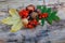 Chestnuts, acorns, mushrooms and red viburnum on a stump