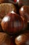 Chestnuts macro over red studio background