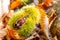 Chestnuts shell close up background - harvesting chestnut in forest with autumn foliage ground