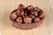 Chestnuts in wicker basket.