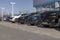 Chevrolet truck and SUV display at a dealership. Chevy offers gasoline, electric, and hybrid electric drive options