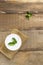 Chia pudding with mint leaves in a white bowl on a wooden background. Rustic style.