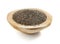 Chia seed served in a wooden bowl