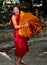 Chiahg Mai, Thailand: Young Monk Carrying Robes