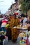 CHIANG KHAN, THAILAND - Jan 1, 2015 : Tourists offerings food to monks