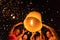 Chiang mai, Thailand - 11/10/2019 : Tourists, people release sky floating lanterns or lamp to worship Buddha`s relics at night.