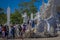 CHIANG RAI, THAILAND - FEBRUARY 01, 2018: Side view of unidentified people at the enter of white temple located in