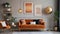 Chic arrangement of a retro living room interior featuring a mock-up poster frame, a velvet sofa, a vintage orange chair...