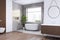 Chic bathroom interior with marble walls, wooden accents, and a cityscape view. Serene design concept.