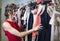 Chic Brunette in Red Choosing a Dress