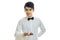 Chic, charming waiter`s shirt and with a butterfly on his neck looks ahead and holds in his hand Bell