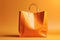 Chic Citrus Splendor: Orange Shopping Bag Appears Empty, Positioned Centrally Against a Vivid Yellow Background, Ample Negative