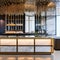 A chic cocktail bar with a mirrored back wall, a sleek marble counter, and a collection of crystal glassware1, Generative AI