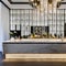 A chic cocktail bar with a mirrored back wall, a sleek marble counter, and a collection of crystal glassware5, Generative AI