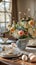 Chic Easter table arrangement features fresh florals and seasonal centerpiece