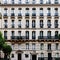 Chic Parisian Apartment: A sophisticated apartment with ornate moldings, velvet upholstery, and a wrought-iron balcony5, Generat