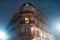 Chic rich building in Strasbourg, perspective view. Fog, night