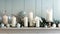 The chic and simplistic style of a mantle adorned with slim taper candles in crisp white radiating a serene glow. 2d