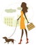 Chic woman walking with dachshund