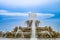 Chicago Buckingham fountain in Grant Park in the morning with cloud and blue sky.