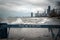 Chicago, IL - March 20th, 2020:  Blue wooden police barricades block off the lakefront trail and bike path due to high winds and